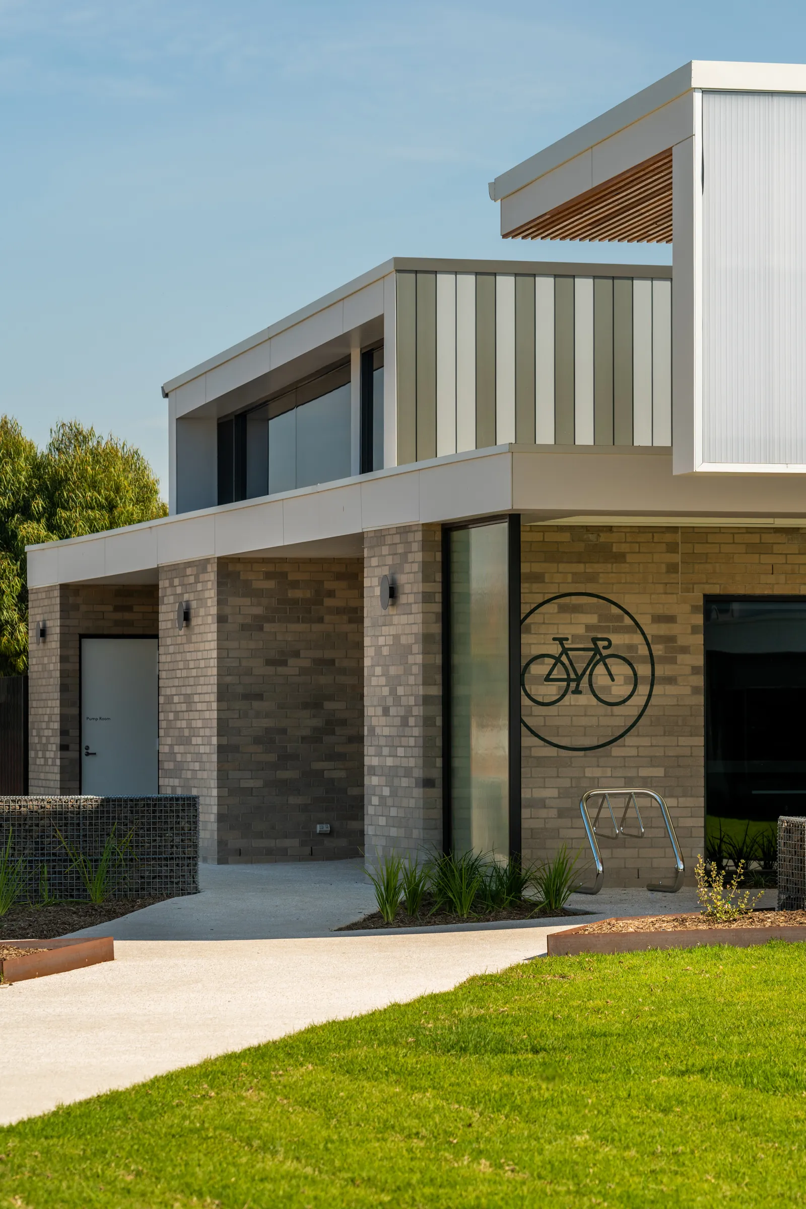 Brick entry facade at 110-122 Unity Drive, Mount Duneed