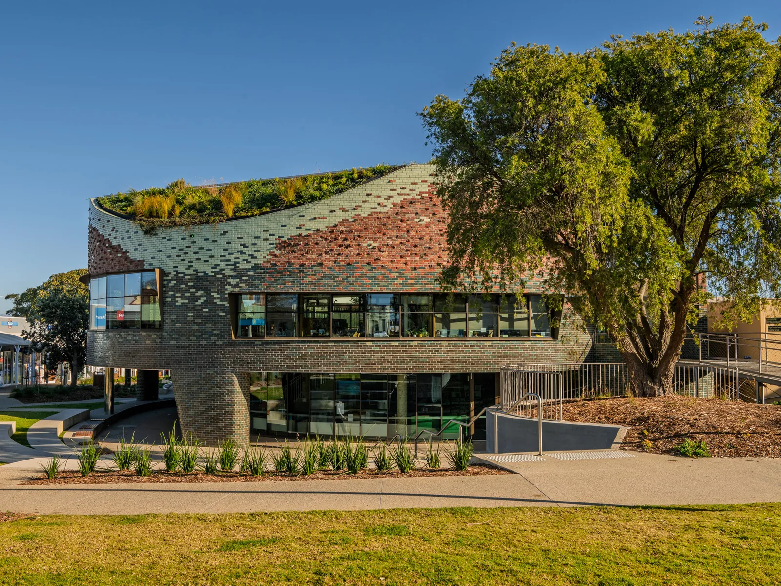 Curved shingle-clad facade of Boronggook Drysdale Library on the Bellarine