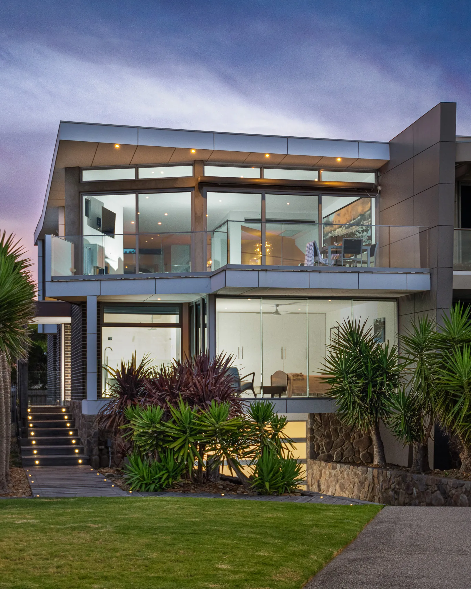 Twilight exterior of a coastal home on The Esplanade, Portarlington